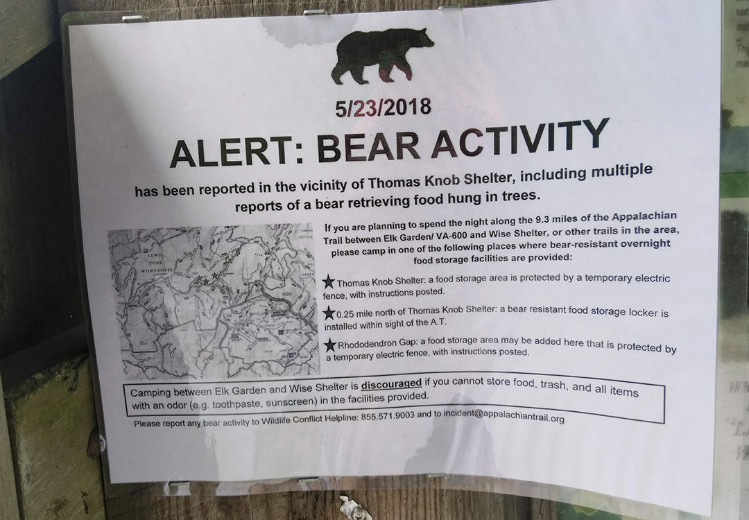 IMG_20180531_154326 Backpacker reaches for his bear spray from the ULA Deploy Bear Canister Holder on his shoulder strap.