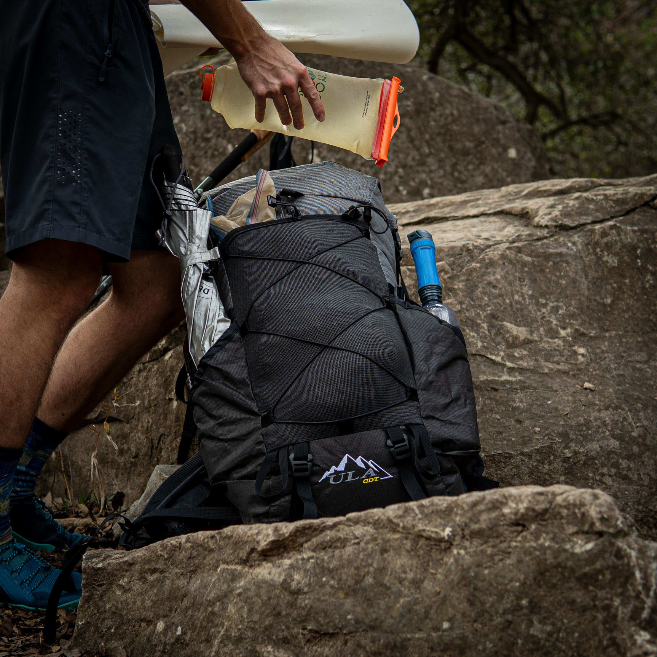a man with a cdt backpack