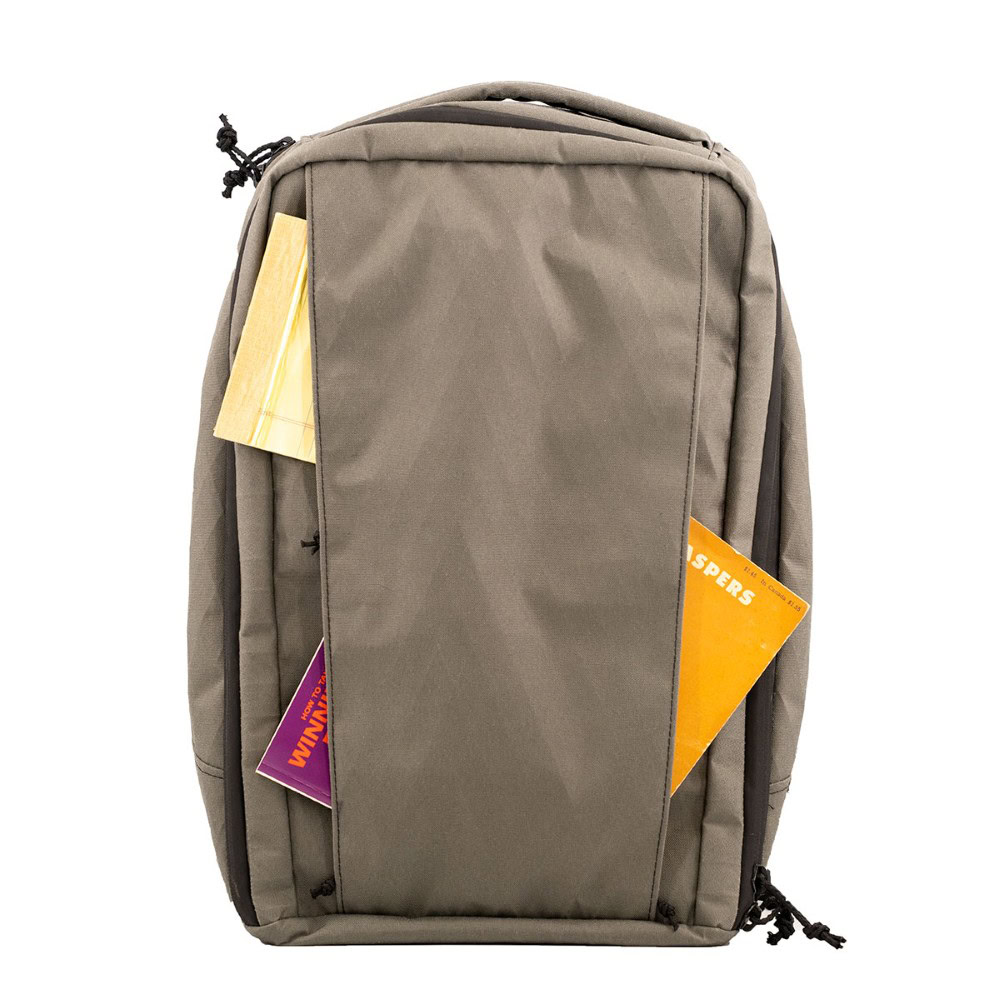 X50 Cicada Daypack Front View with notebooks sticking out of front pocket