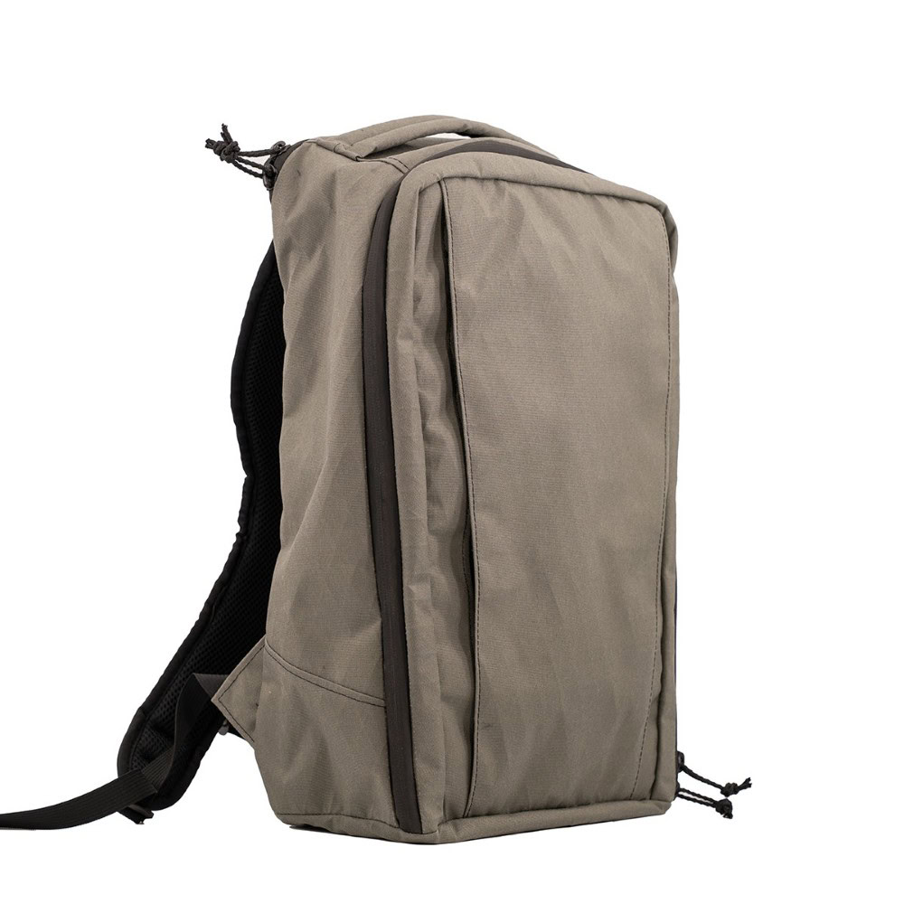 A 3/4 side view of the ULA X50 Cicada Daypack in the color Foliage