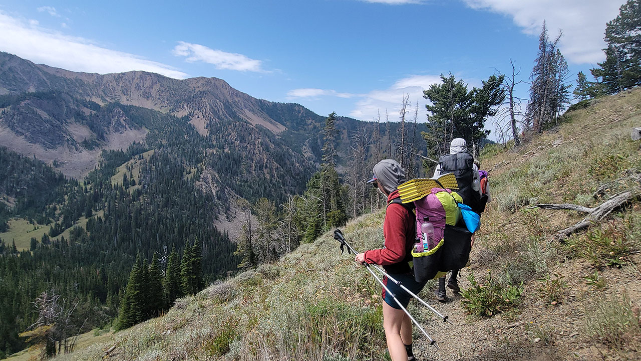 A man and woman hiking in montana